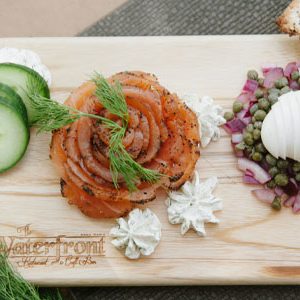 House Cold Smoked Salmon Appetizer with Bread Wafers and Egg